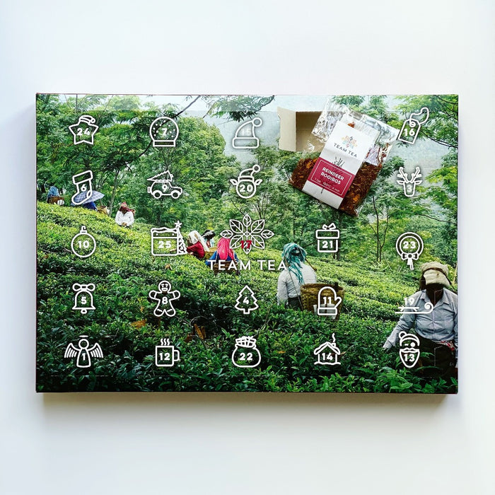 Picture showing advent calendar on white background. One of the doors has been opened and a sachet of tea is shown on the calendar