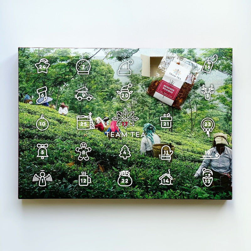 Picture showing advent calendar on white background. One of the doors has been opened and a sachet of tea is shown on the calendar