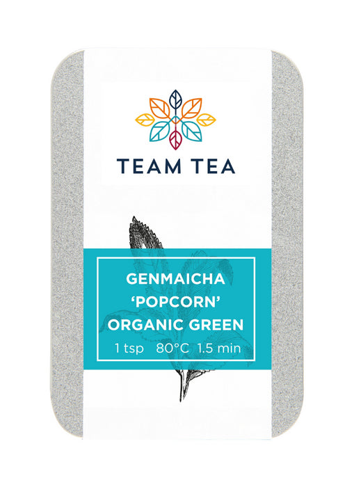 A metal tin with a turquoise label and sketch of tea plant. Inside is loose-leaf Organic green tea from Japan.