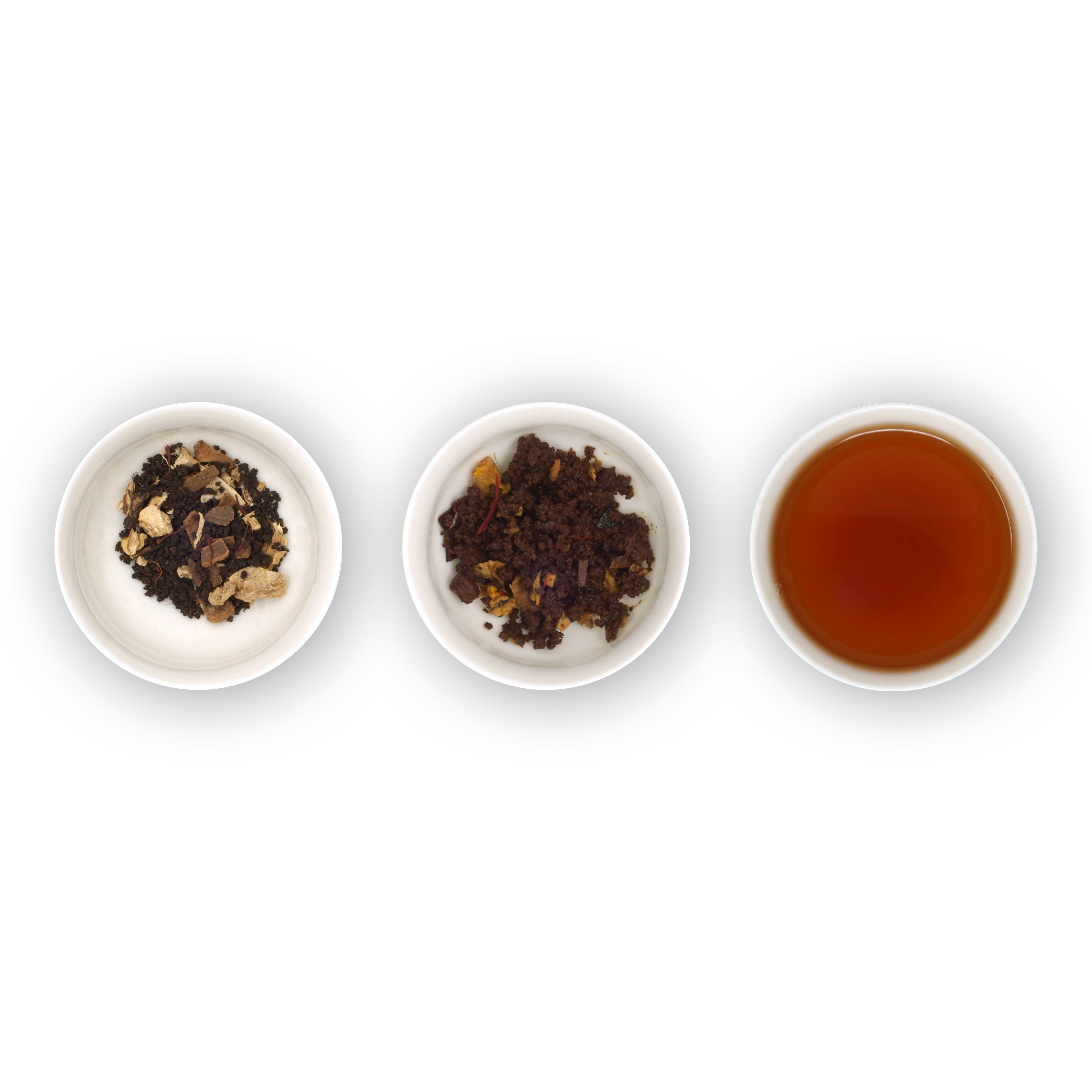 Three white bowls containing dry tea (chai) leaves and spices, and one bowl with brewed tea