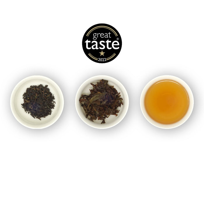 3 ramekins on a white background showing dry leaf, wet leaf and brewed tea