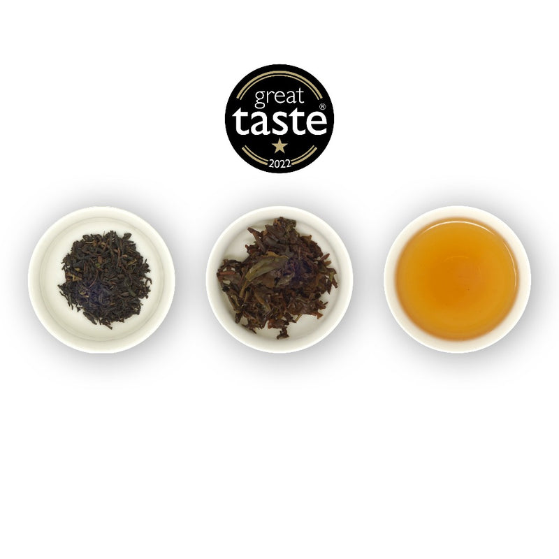 3 ramekins on a white background showing dry leaf, wet leaf and brewed tea