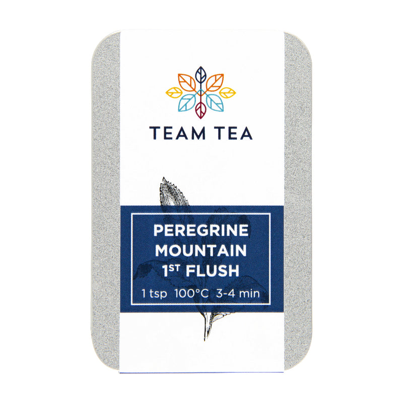 A slide tin of Peregrine Mountain 1st Flush on a white background