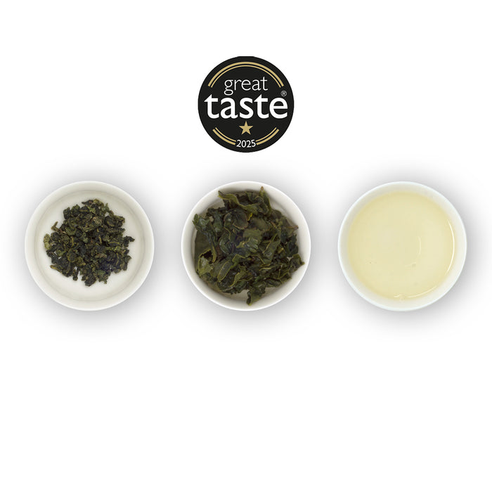 Three bowls of tea leaves with a 'Great Taste' award badge on a white background