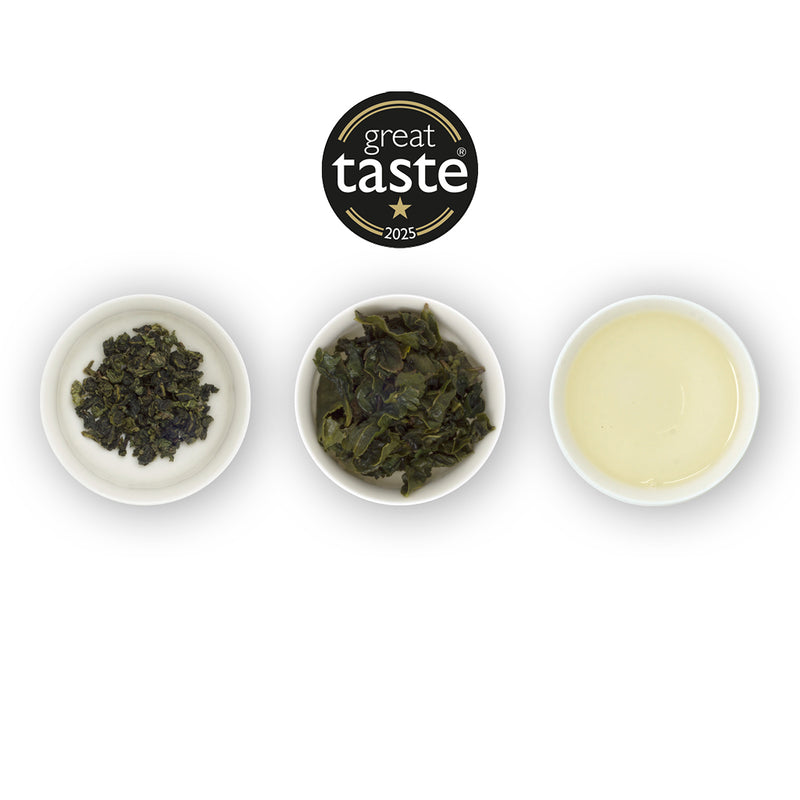 Three bowls of tea leaves with a 'Great Taste' award badge on a white background